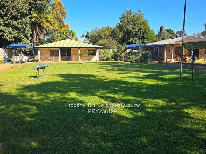 Forsale~Prime Investment : Exclusive 2-Acre Mount Pleasant Estate with Triple Road Frontage